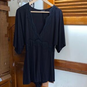 Topshop black jersey romper with lace detail size 4